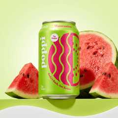 Editorial product photo of a watermelon soda can with watermelon slices on a green backdrop